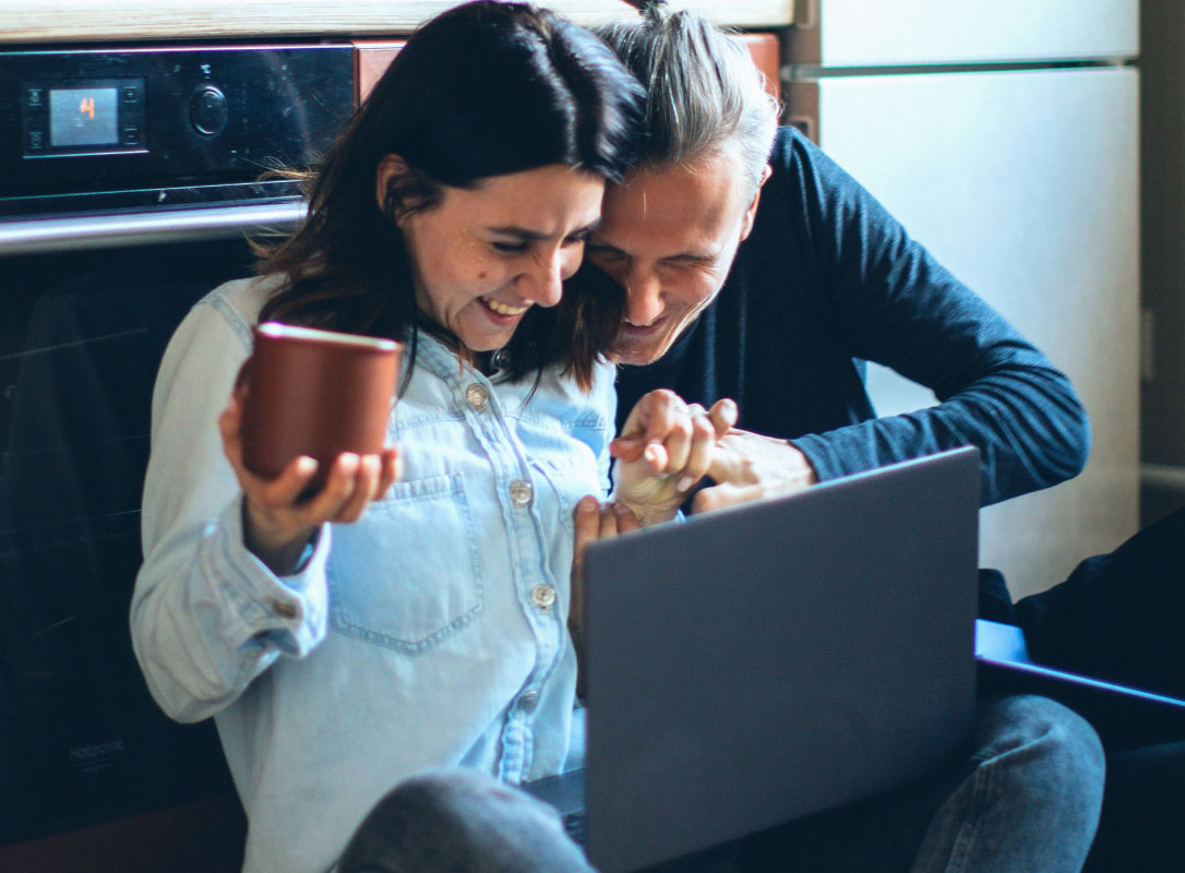 couple looking at laptop