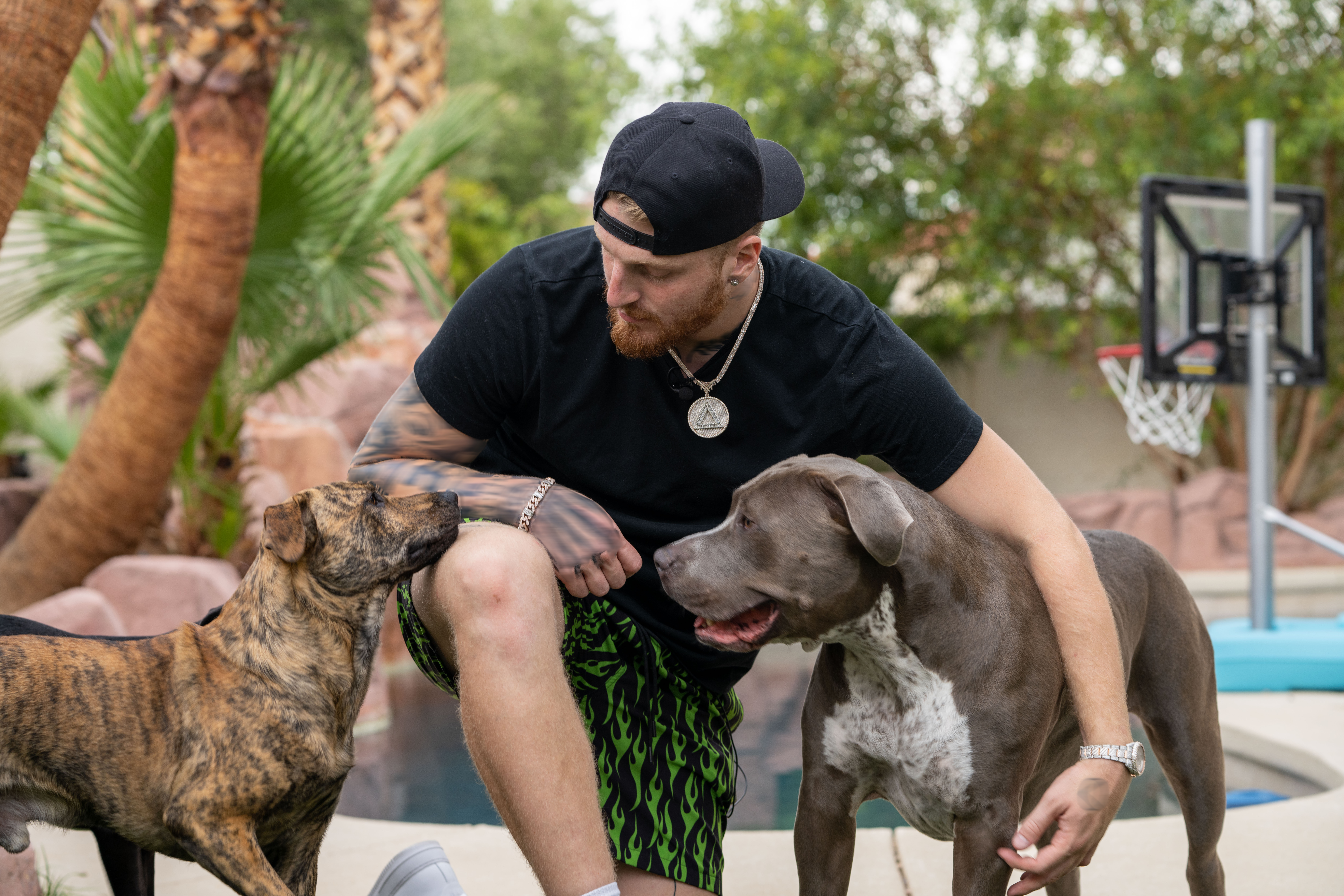 Maxx Crosby with pitbulls