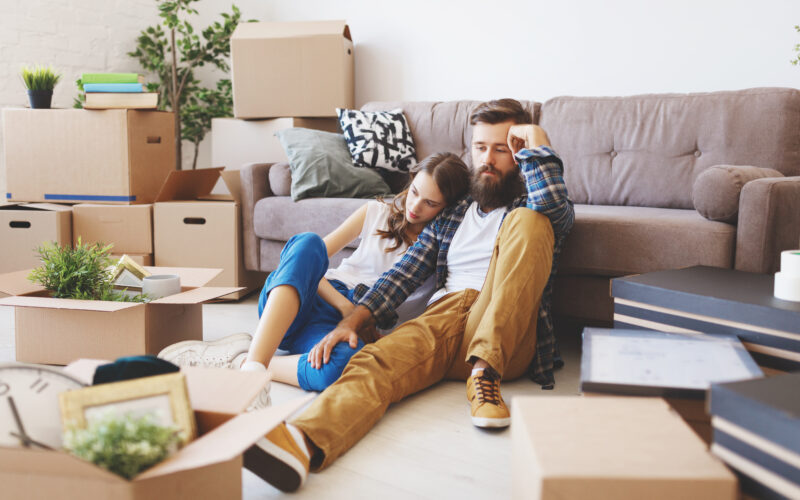 couple dealing with the stress of buying a house