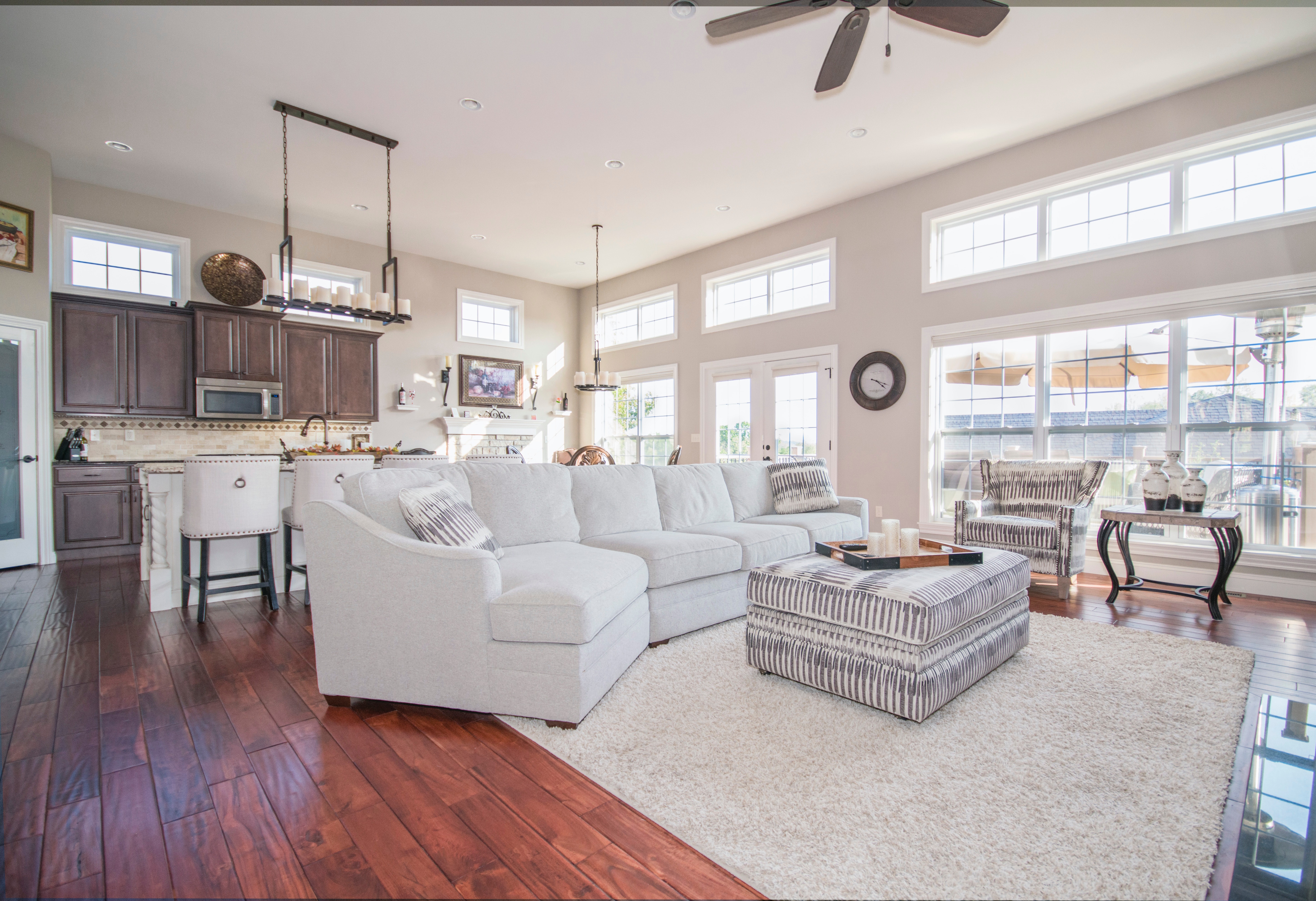 beautiful white living room with white furniture, staged to sell