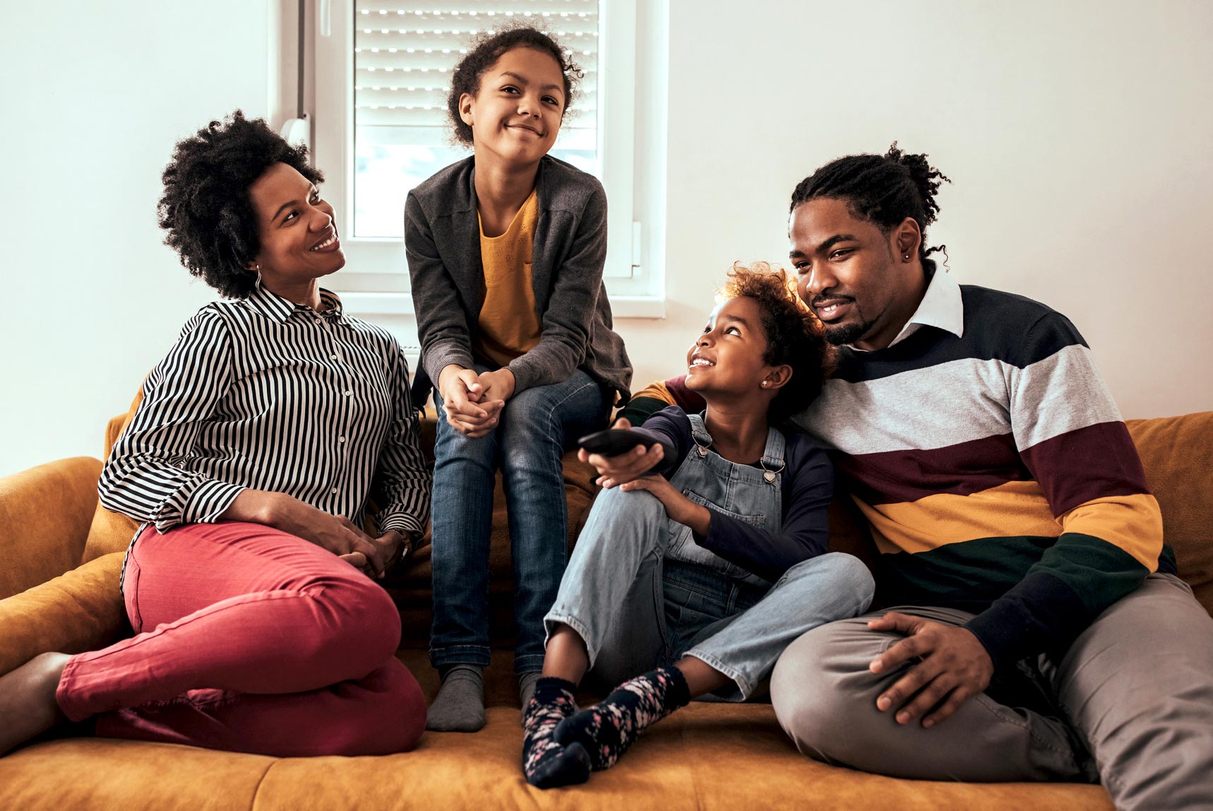 Black family together at home