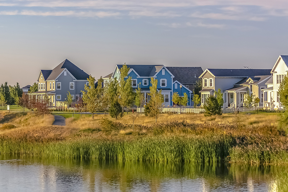 landscape photo of daybreak community by the lake