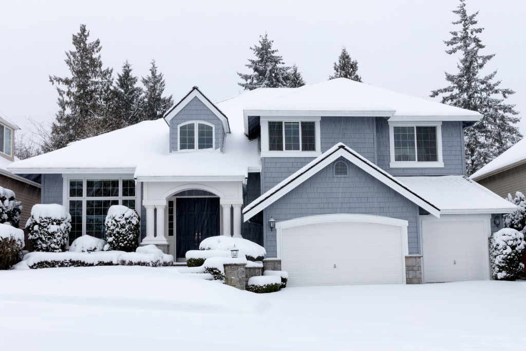 blue home covered with snow